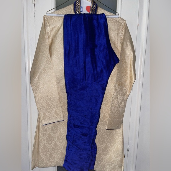 Cream and blue colored sherwani set with matching blue pants. - Picture 2 of 2